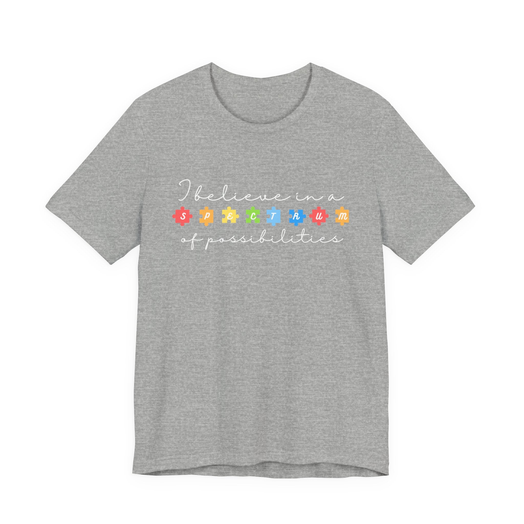 I Believe in a Spectrum of Possibilities T-Shirt | Autism Awareness puzzle pieces | White writing