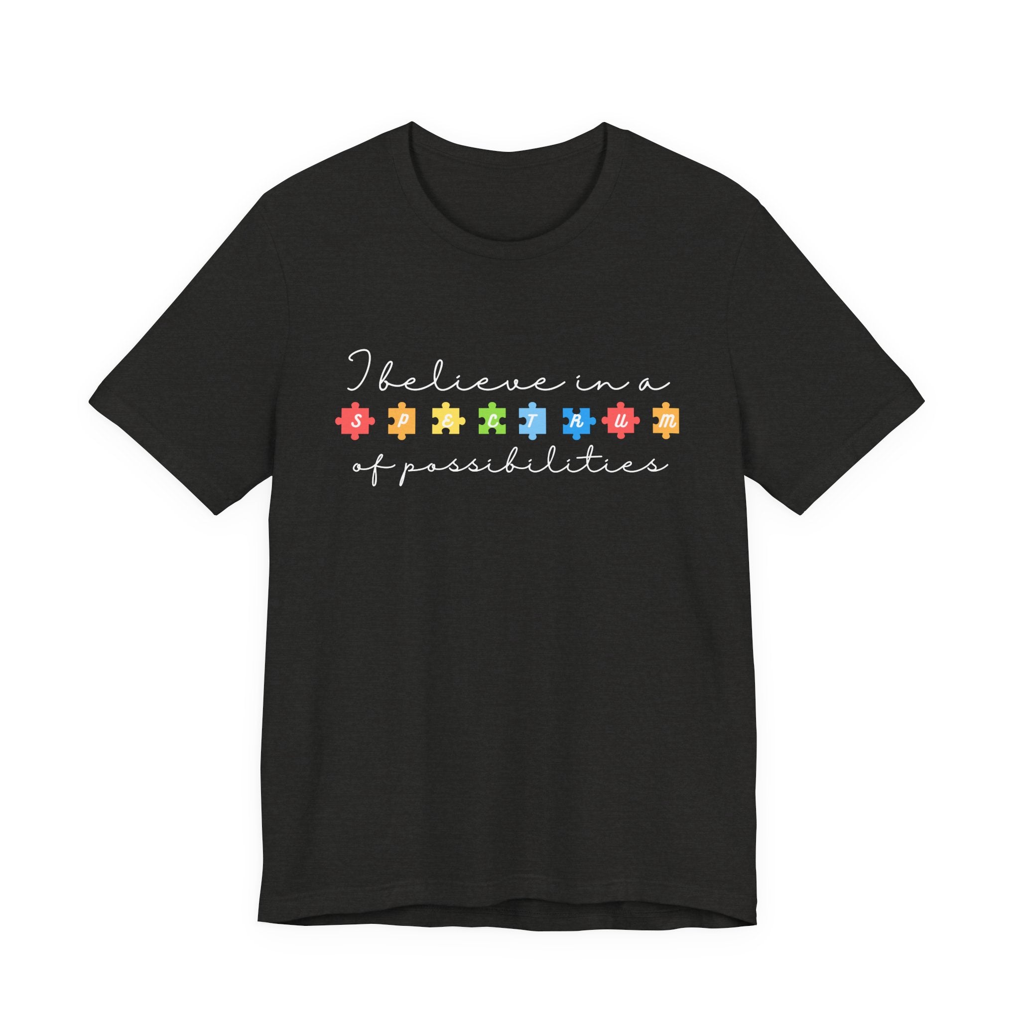 I Believe in a Spectrum of Possibilities T-Shirt | Autism Awareness puzzle pieces | White writing
