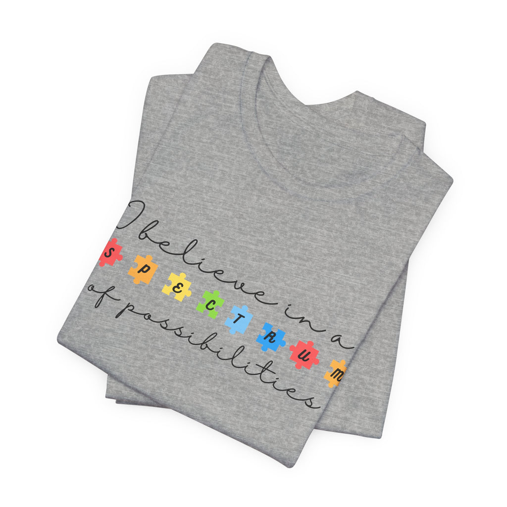 I Believe in a Spectrum of Possibilities T-Shirt | Autism Awareness, Colorful Puzzle Pieces | Black Writing