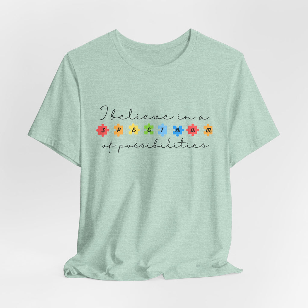 I Believe in a Spectrum of Possibilities T-Shirt | Autism Awareness, Colorful Puzzle Pieces | Black Writing