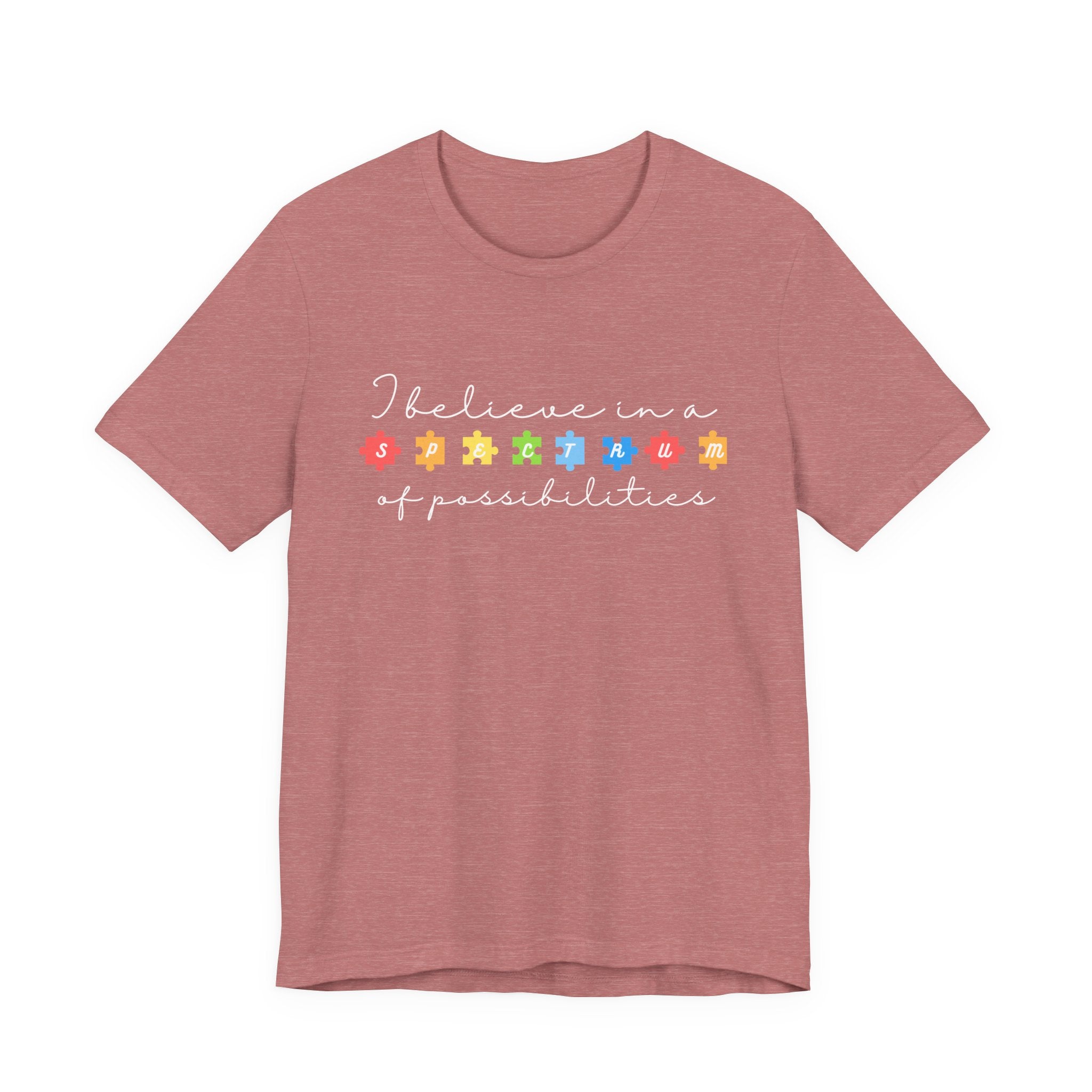 I Believe in a Spectrum of Possibilities T-Shirt | Autism Awareness puzzle pieces | White writing