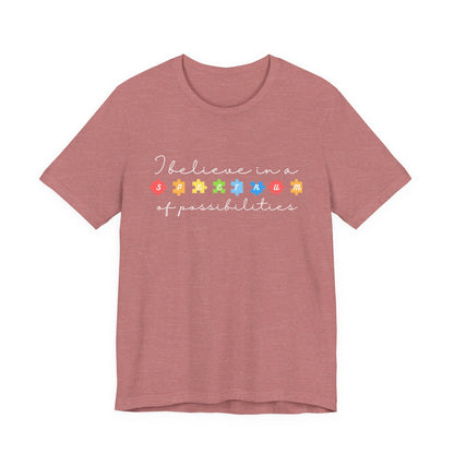 I Believe in a Spectrum of Possibilities T-Shirt | Autism Awareness puzzle pieces | White writing