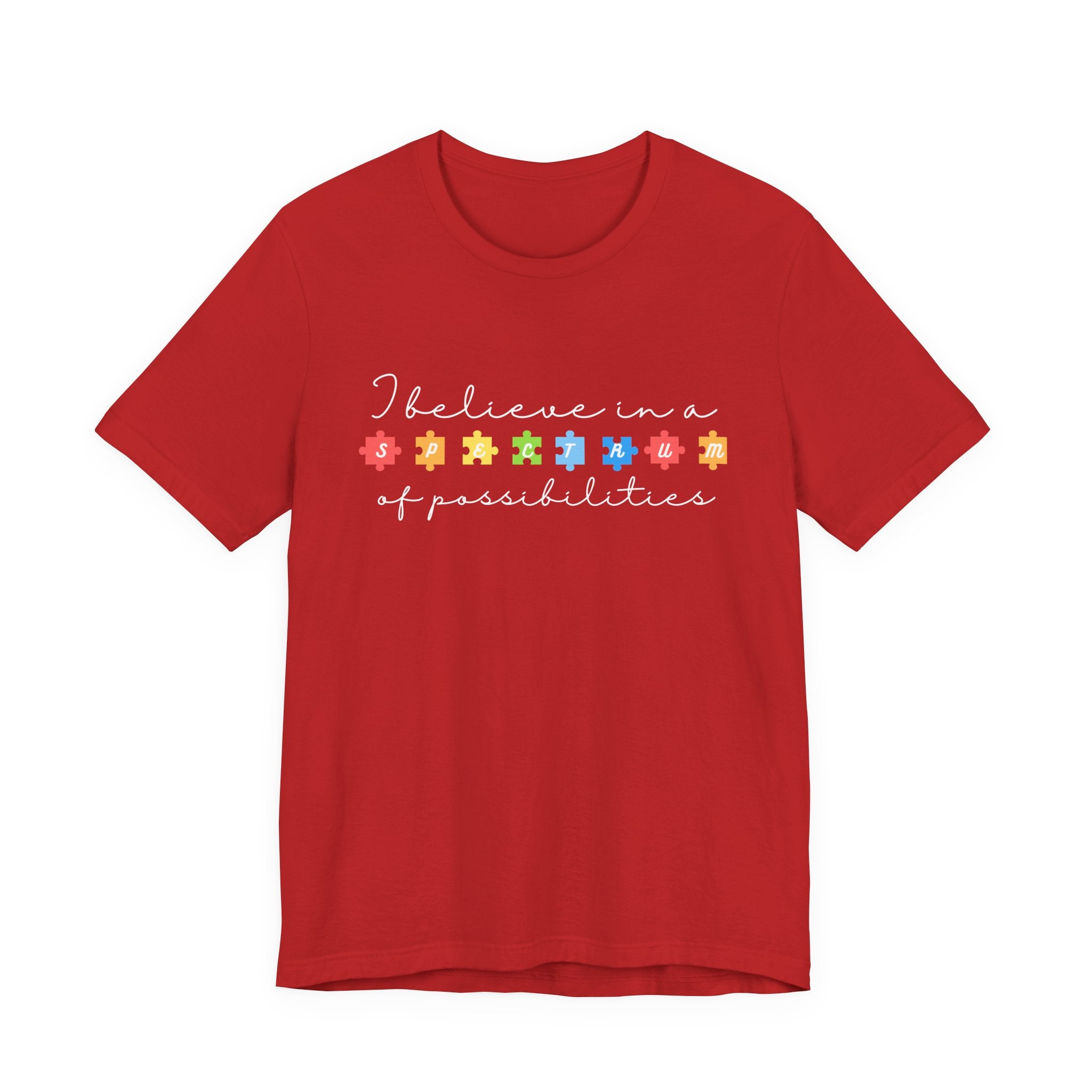 I Believe in a Spectrum of Possibilities T-Shirt | Autism Awareness puzzle pieces | White writing