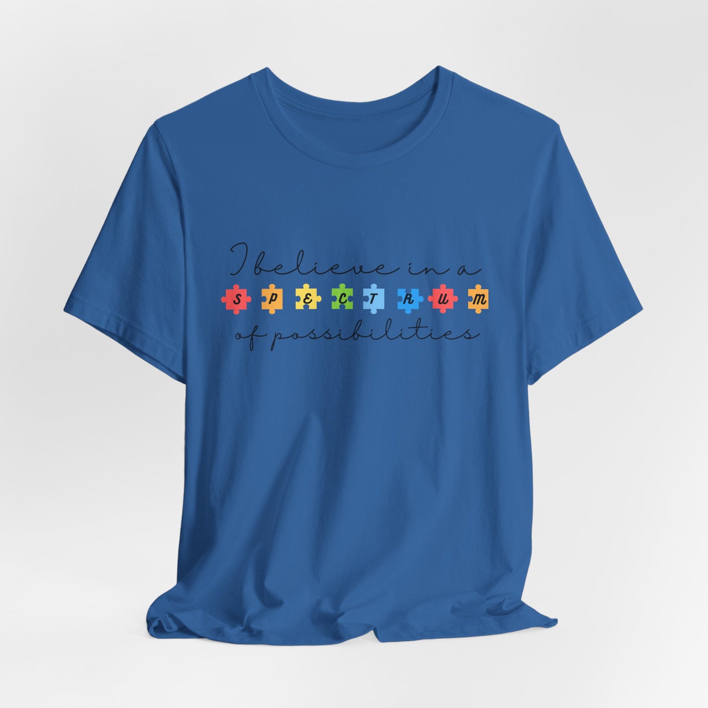 I Believe in a Spectrum of Possibilities T-Shirt | Autism Awareness, Colorful Puzzle Pieces | Black Writing