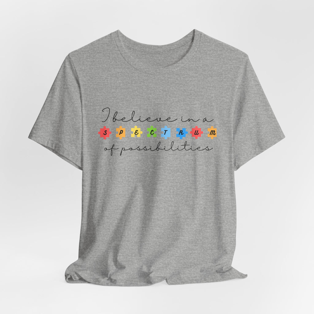 I Believe in a Spectrum of Possibilities T-Shirt | Autism Awareness, Colorful Puzzle Pieces | Black Writing