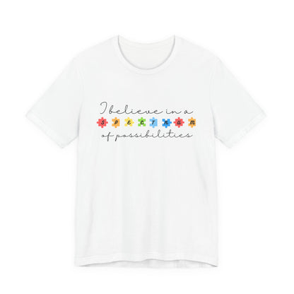 I Believe in a Spectrum of Possibilities T-Shirt | Autism Awareness, Colorful Puzzle Pieces | Black Writing