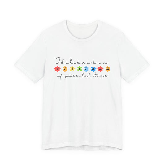 I Believe in a Spectrum of Possibilities T-Shirt | Autism Awareness, Colorful Puzzle Pieces | Black Writing