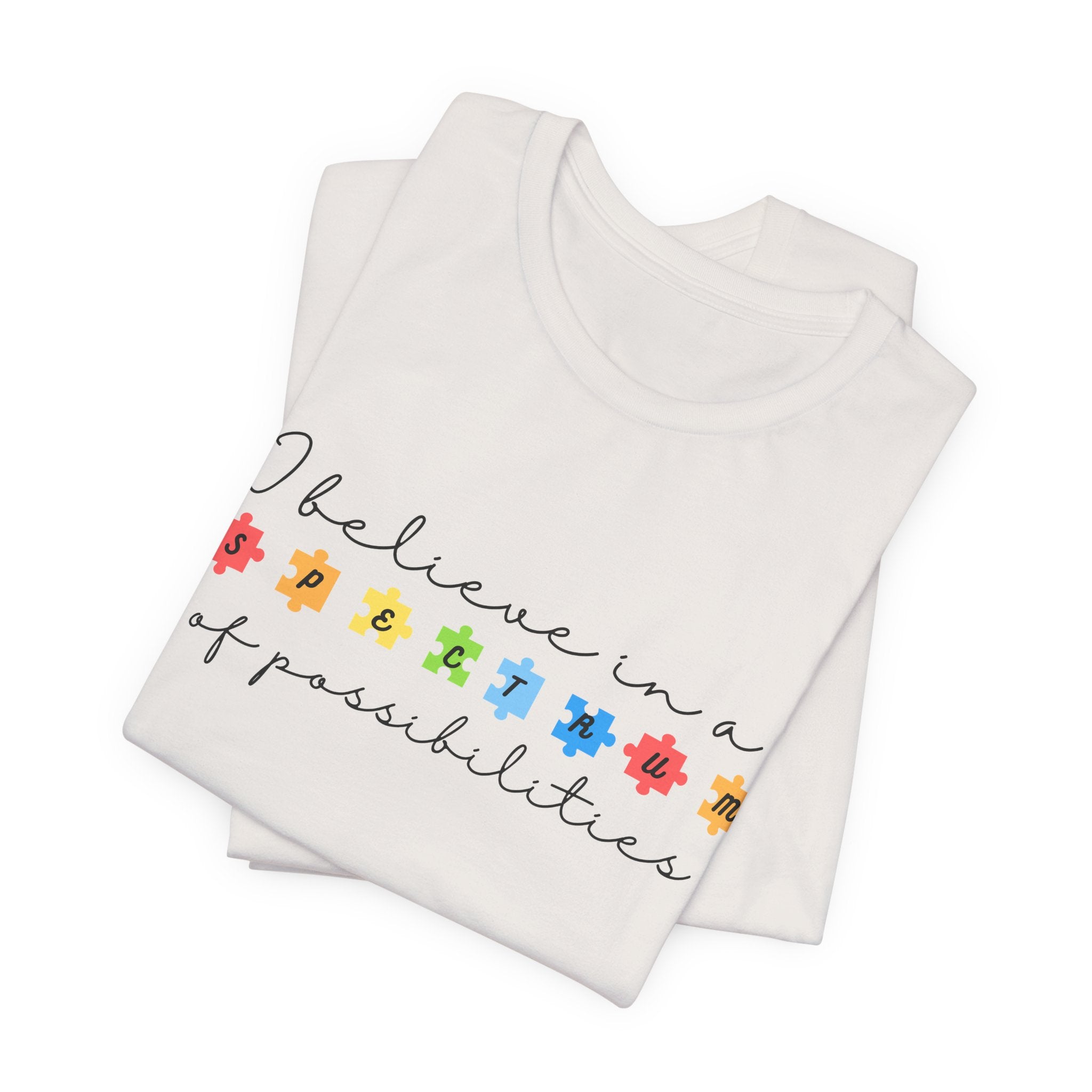 I Believe in a Spectrum of Possibilities T-Shirt | Autism Awareness, Colorful Puzzle Pieces | Black Writing