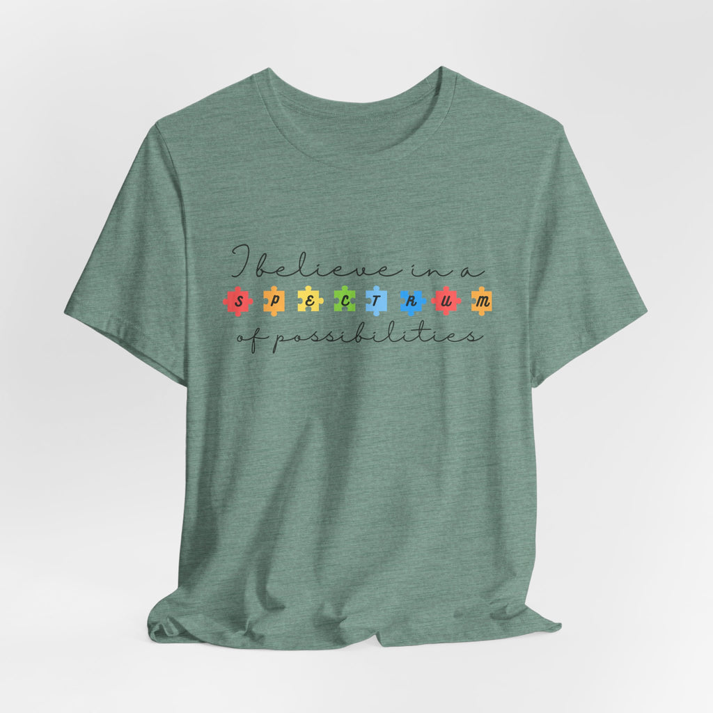 I Believe in a Spectrum of Possibilities T-Shirt | Autism Awareness, Colorful Puzzle Pieces | Black Writing