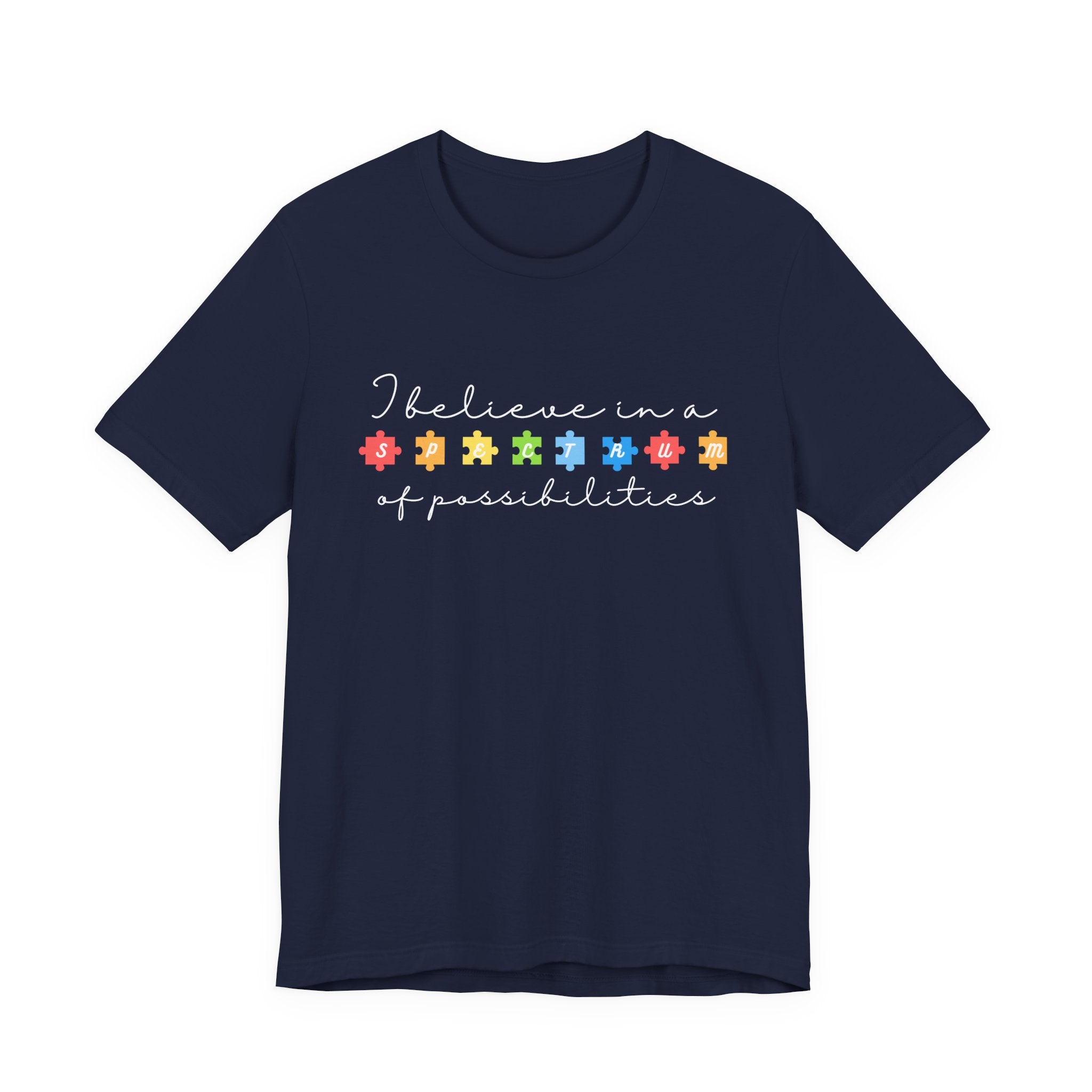 I Believe in a Spectrum of Possibilities T-Shirt | Autism Awareness puzzle pieces | White writing