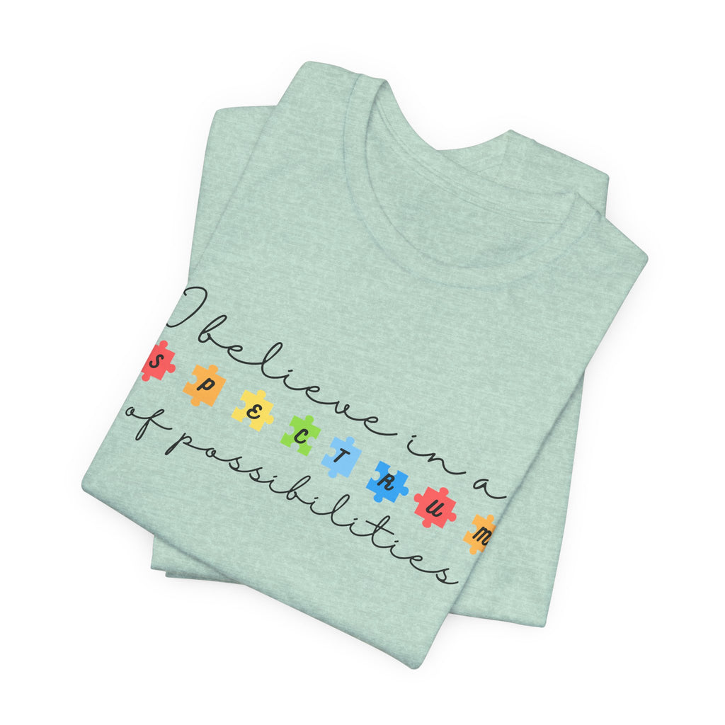 I Believe in a Spectrum of Possibilities T-Shirt | Autism Awareness, Colorful Puzzle Pieces | Black Writing