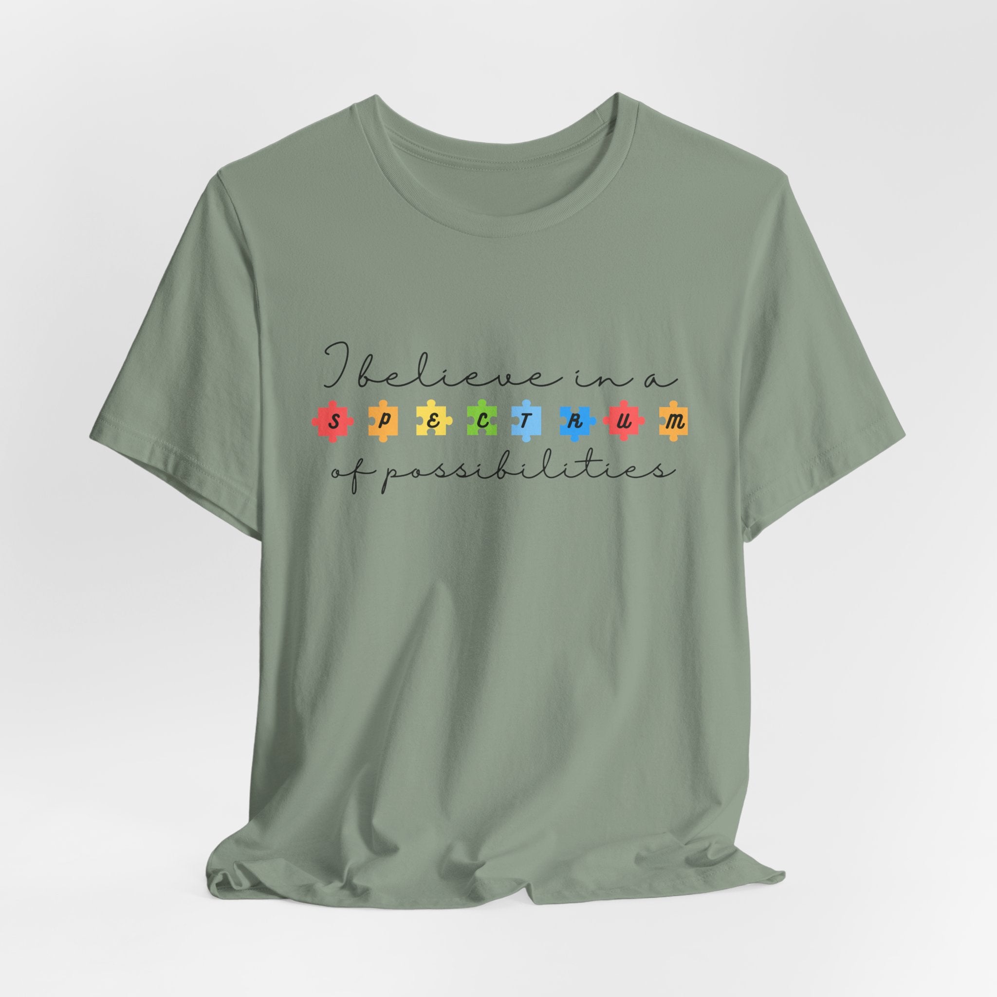 I Believe in a Spectrum of Possibilities T-Shirt | Autism Awareness, Colorful Puzzle Pieces | Black Writing
