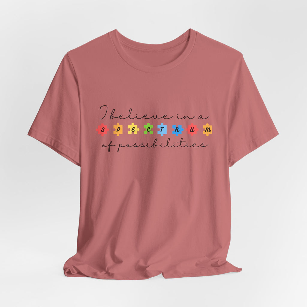 I Believe in a Spectrum of Possibilities T-Shirt | Autism Awareness, Colorful Puzzle Pieces | Black Writing