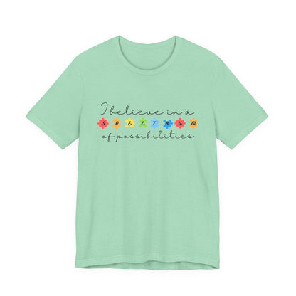 I Believe in a Spectrum of Possibilities T-Shirt | Autism Awareness, Colorful Puzzle Pieces | Black Writing