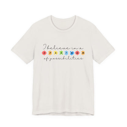 I Believe in a Spectrum of Possibilities T-Shirt | Autism Awareness, Colorful Puzzle Pieces | Black Writing
