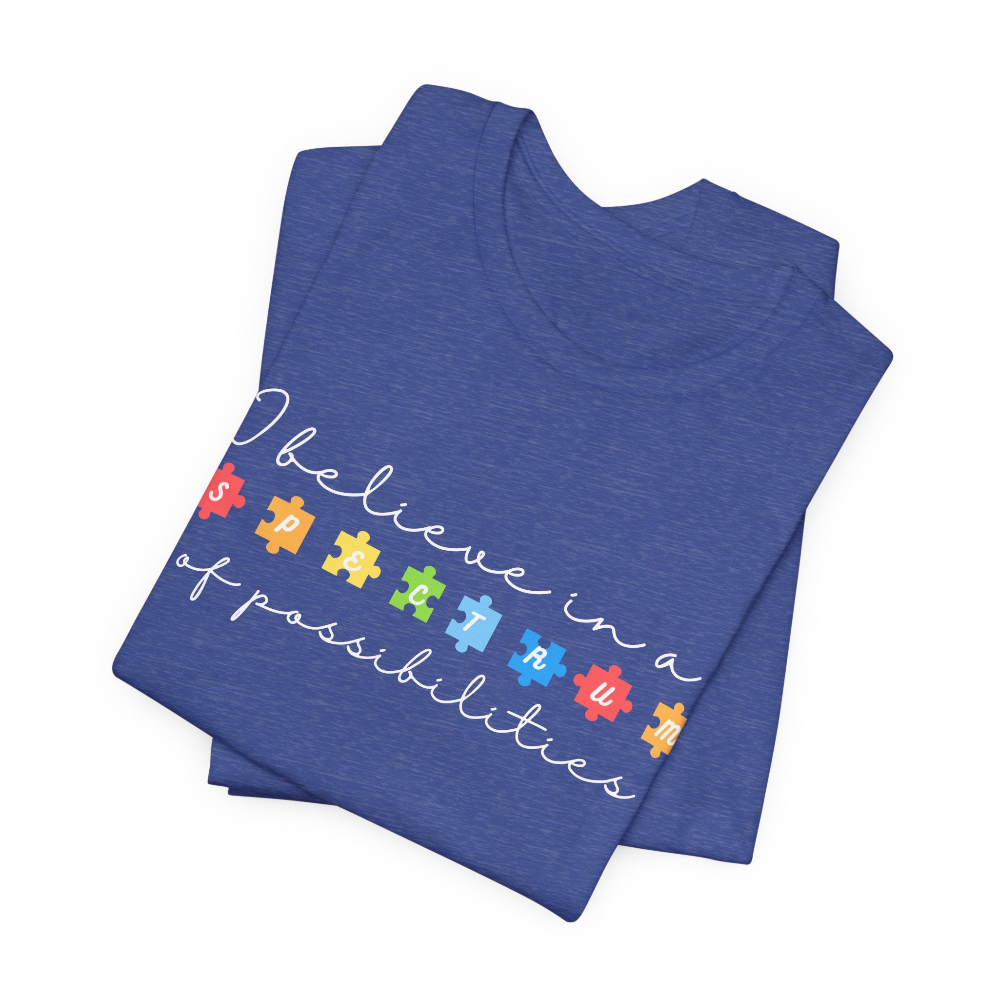 I Believe in a Spectrum of Possibilities T-Shirt | Autism Awareness puzzle pieces | White writing